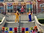 Disneyland characters pluto goofy minnie train station