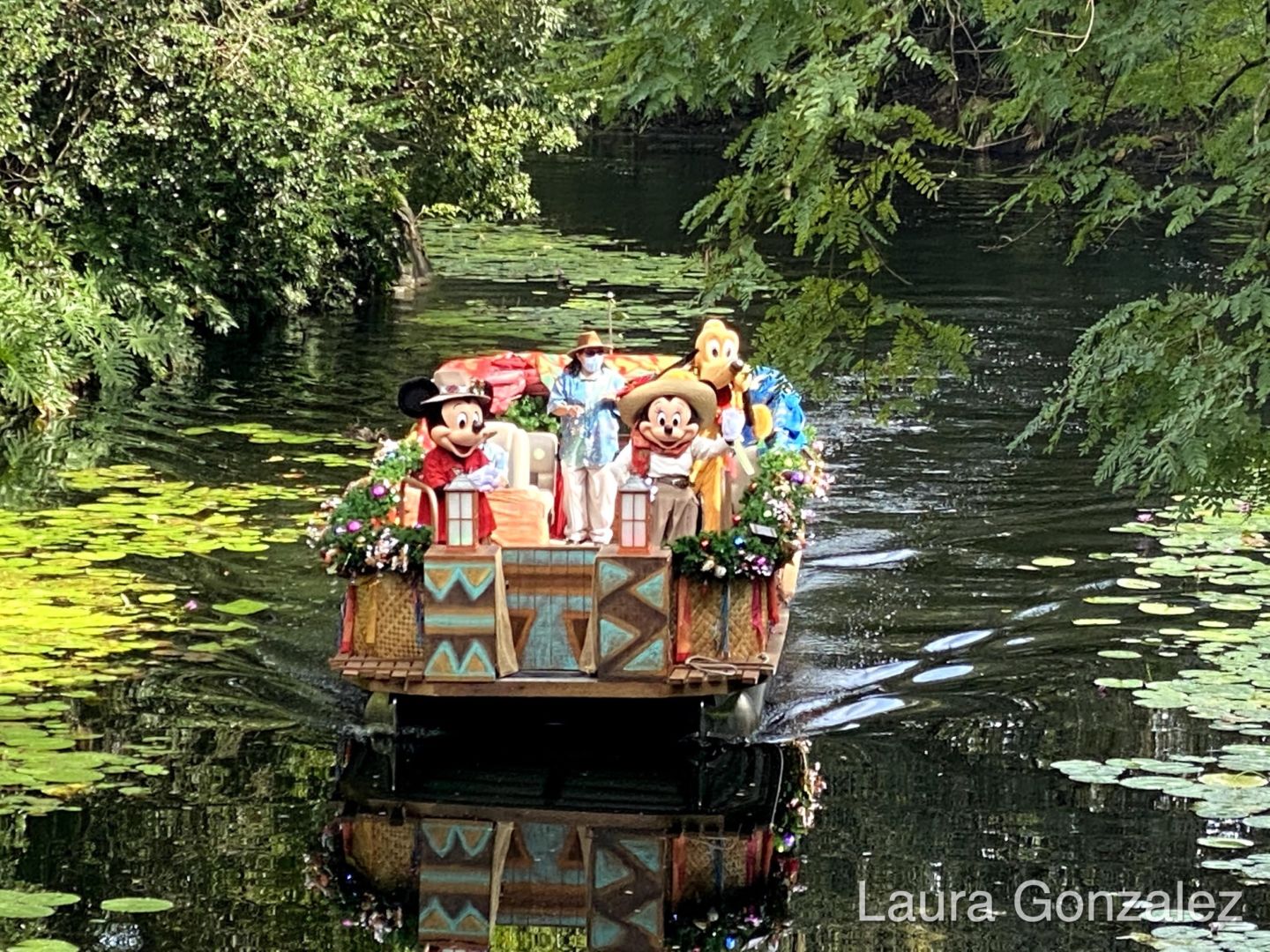 Mickey, Minnie and Pluto holiday flotilla at Animal Kingdom