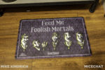 downtown-disney-disney-home-haunted-mansion-singing-busts-feed-me-foolish-mortals-pet-mat