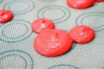 Jolly Holiday Raspberry Mickey Macaron on baking sheet 3-micechat
