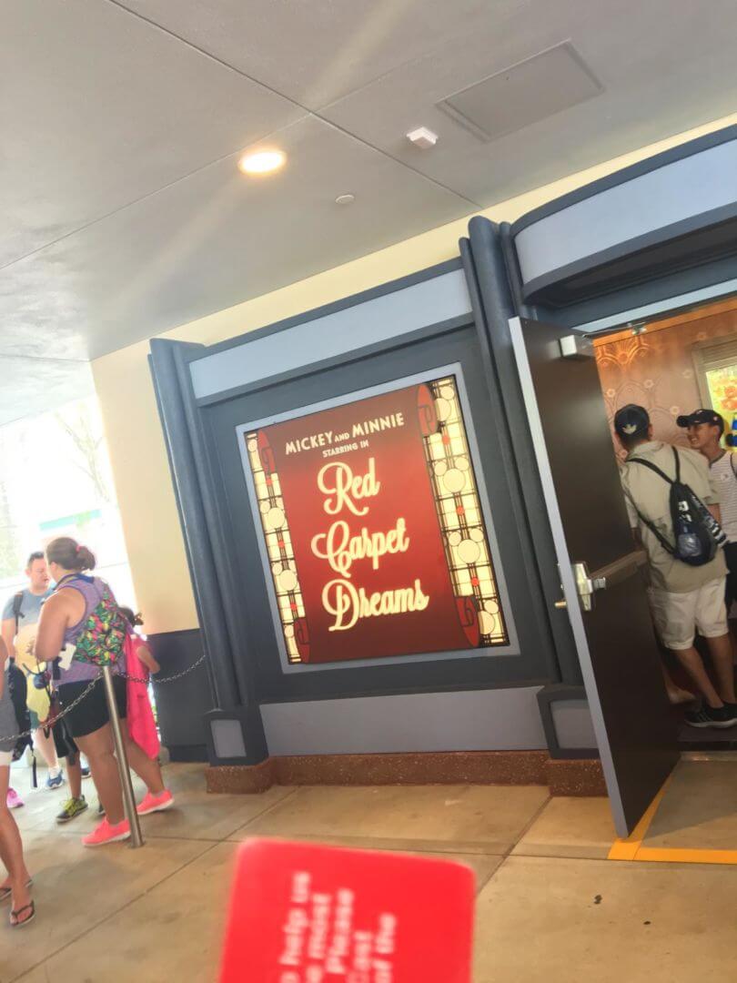 Sign reading Mickey and Minnie Red Carpet Dreams