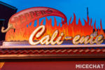 Disneyland DCA Food Wine Booth Peppers cali-ente sign night