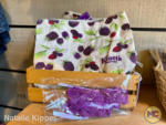 knotts-boysensberry-festival-2022-merchandise-makeup-pouch-and-garter