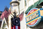 Disneyland Main Street Magic Shop marquee lamp post American flags DSC_1554-4K