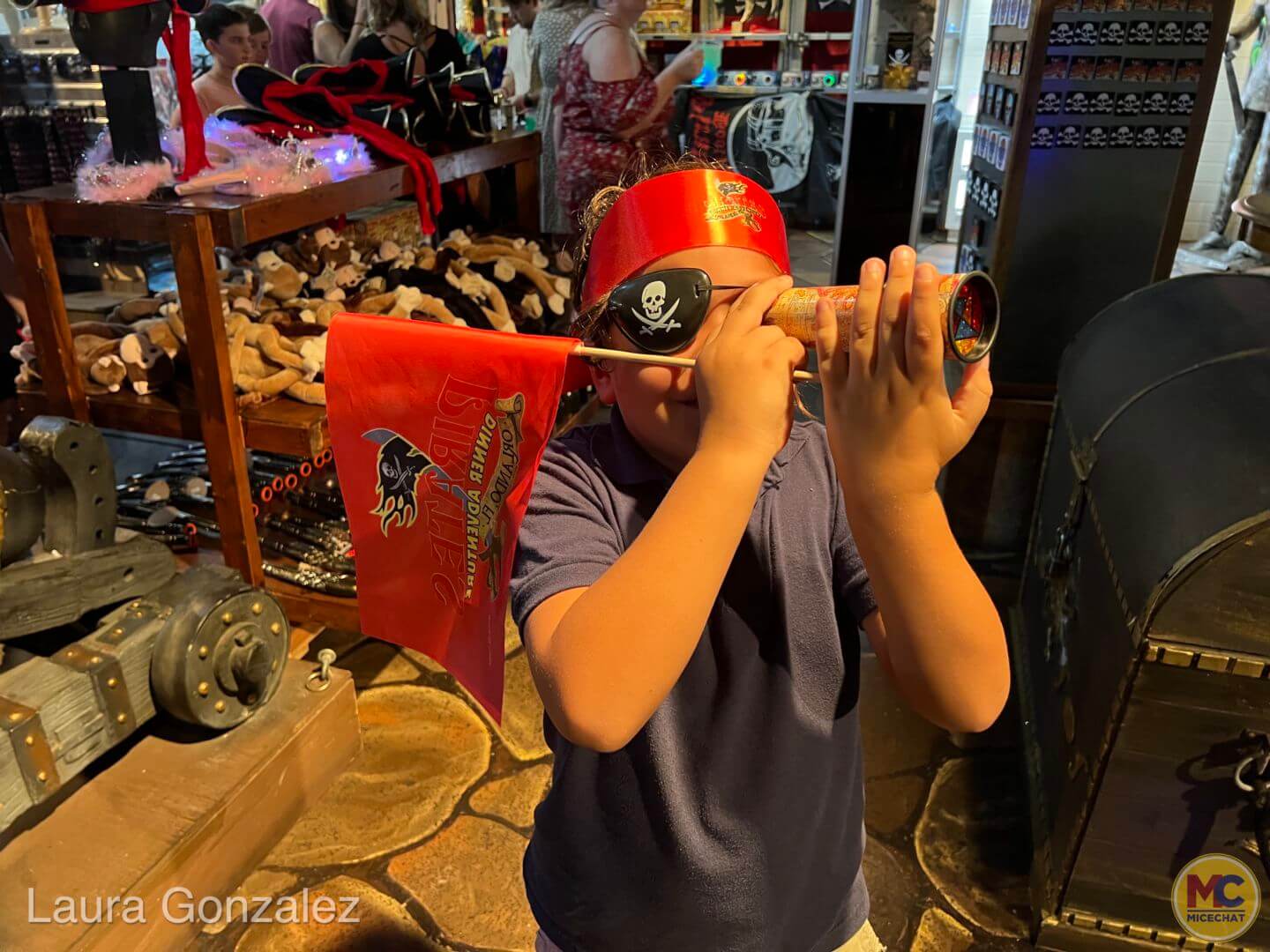 Johnny finds a spyglass at Pirates Dinner Adventure