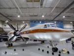 Walt Disney archives mickey mouse one palm springs air museum overview plane angle MiceChat