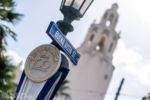 Disney100 Celebration decorations Disney California Adventure Buena Vista Street banners medallion lamppost DSC_1007-X5-1