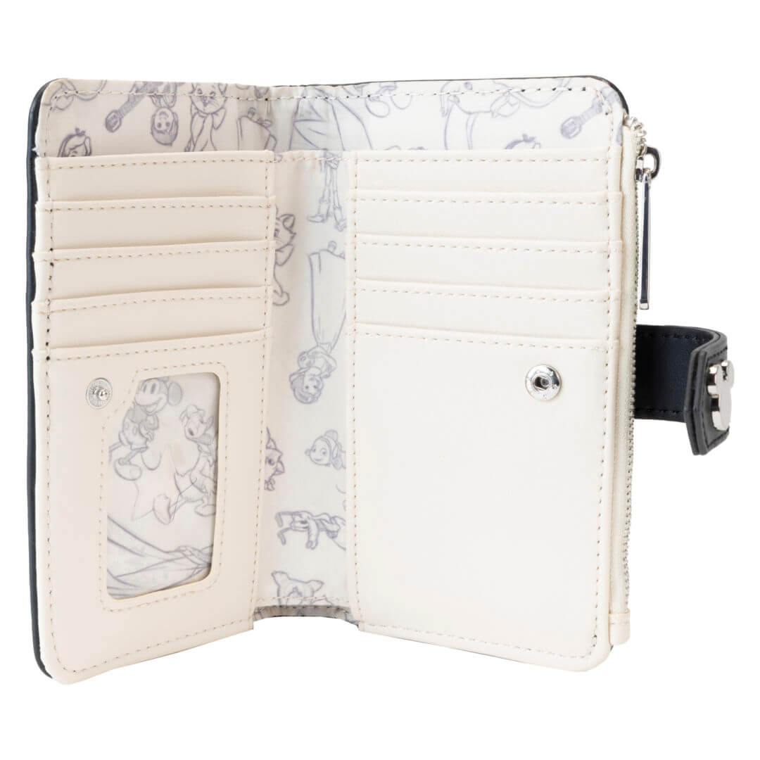 The lining of the Loungefly's Disney 100 Sketchbook Collection Flap Wallet is covered in character sketches.