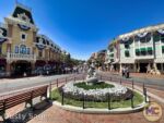crowds main street mickey statue