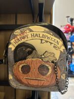 Halloween Horror Nights merchandise raven pumpkin loungefly
