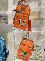 Destination D23 2023-Lug x Disney Parks bags-orange bird character skeeter bag-front and bag