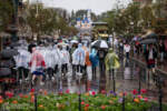 Disneyland Main Street USA in the rain guests in ponchos DSC_1532-X5