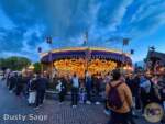 Disneyland Beauty Clouds Fantasyland Carousel crowds line MiceChat