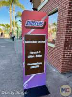 Disneyland festivals super bowl snickers stage sign MiceChat