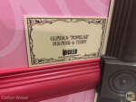 Glinda’s “Popular” Peignoir and Teddy plaque interior Wicked store at Universal Orlando Resort