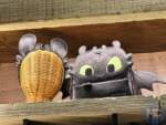 Universal Epic Universe Isle of Berk merch dragon bag and ears display MiceChat
