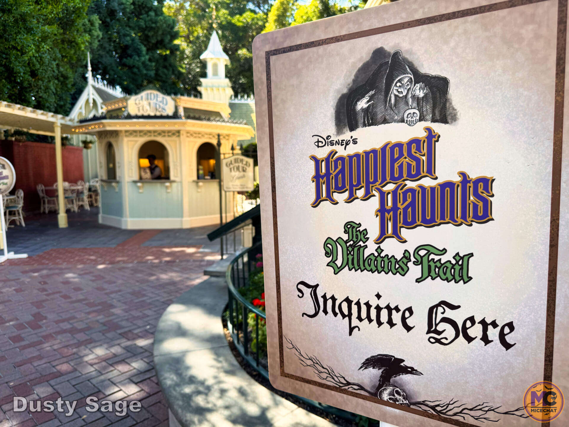 A guide leads the Happiest Haunts Guided Tour at Disneyland during Halloween Time