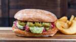 2025-DLR-Holiday-Foodie-Guide-Carnitas-Torta