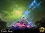 Disneyland beauty christmas castle fireworks green with spotlights MiceChat
