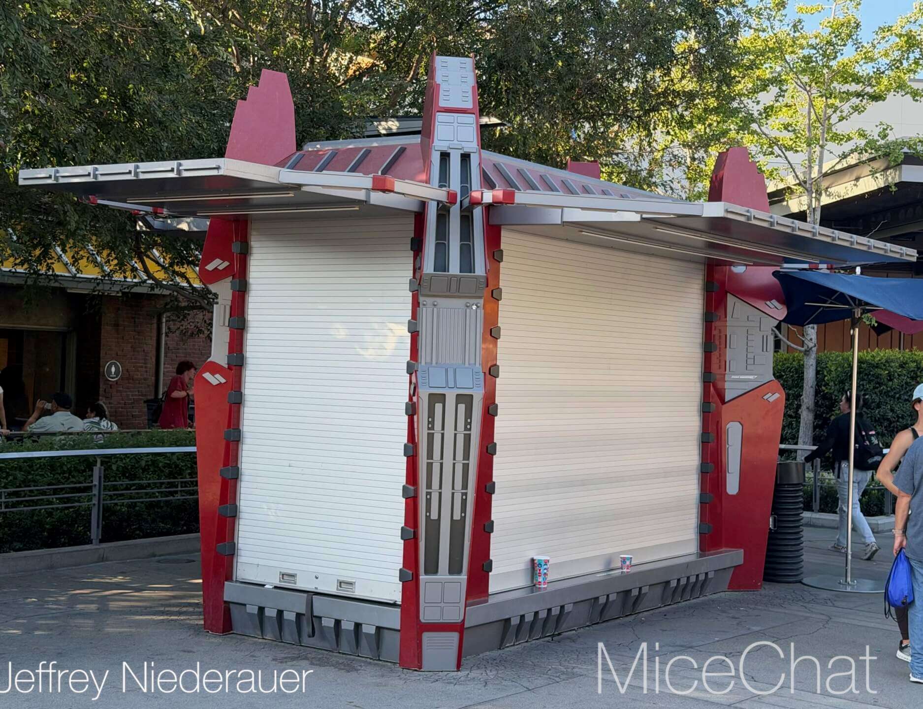 Closed merchandise cart with plain white doors in Avengers Campus