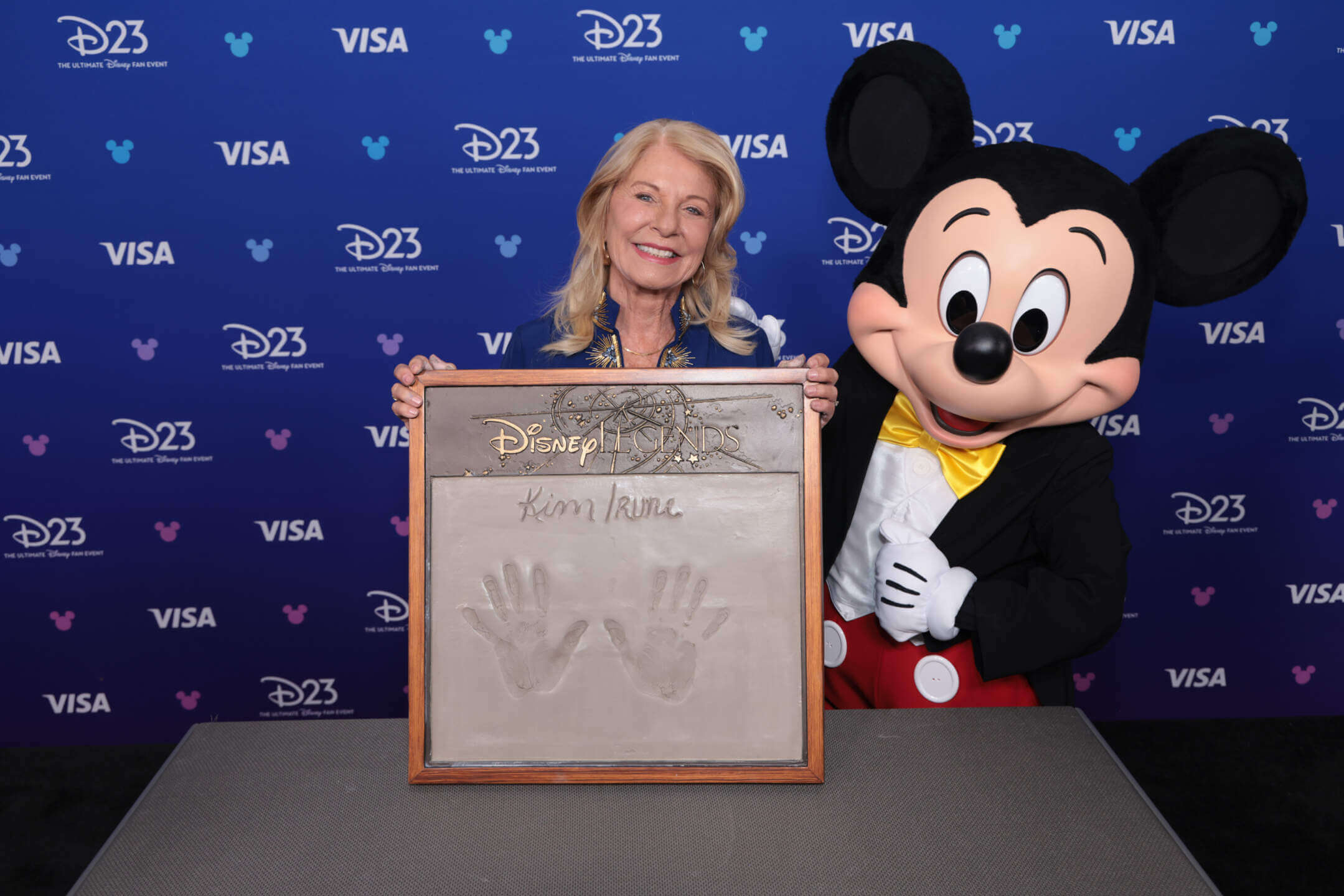 Imagineer Kim Irvine accepts her Disney Legends award at D23 2026