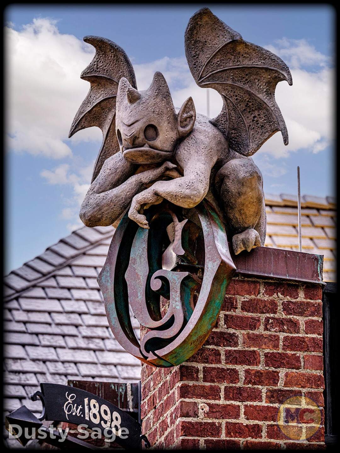 Gargoyle figure among the gothic decor at Gideon's Bakehouse