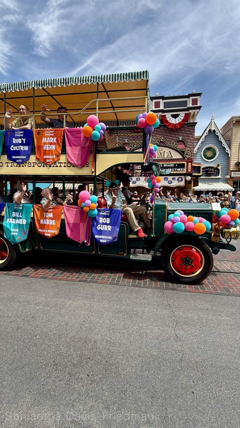 Guests line Main Street for the D23 Day Disney Legends cavalcade at Disneyland