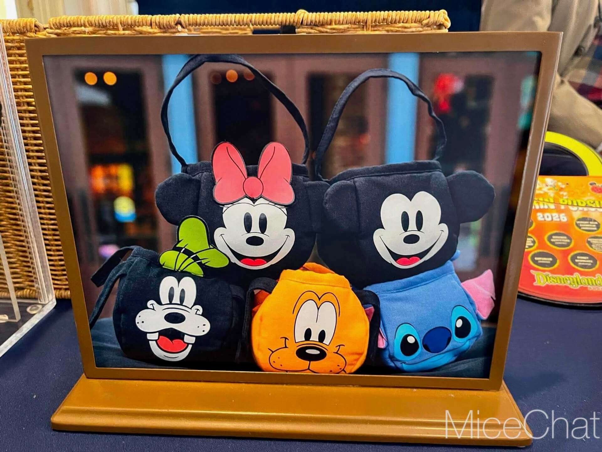 Pluto's Pumpkin Pursuit prize bags at the Disneyland Resort for Halloween 2026