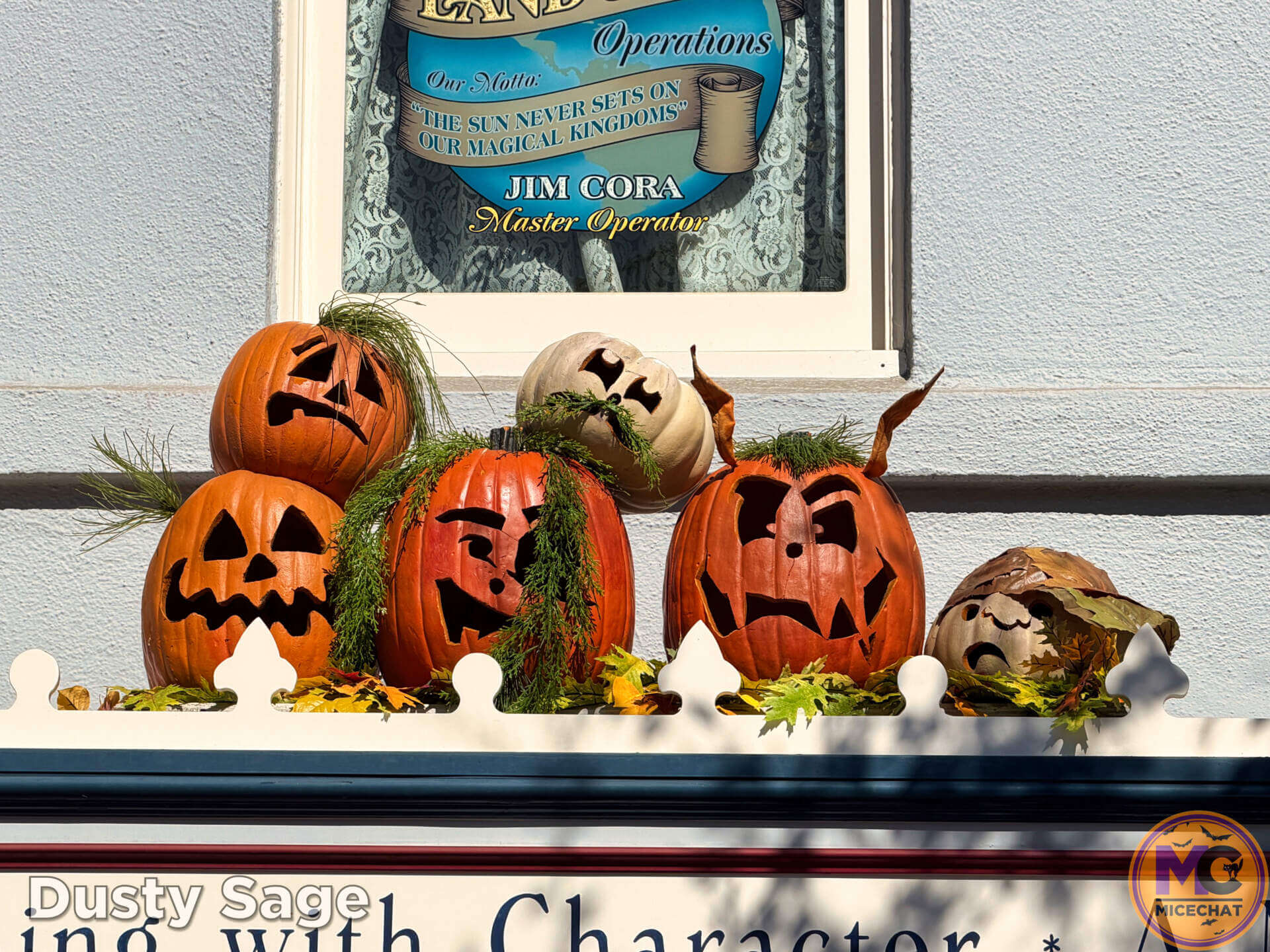 Disneyland Halloween pumpkin with braided hair on the Main Street lamp posts