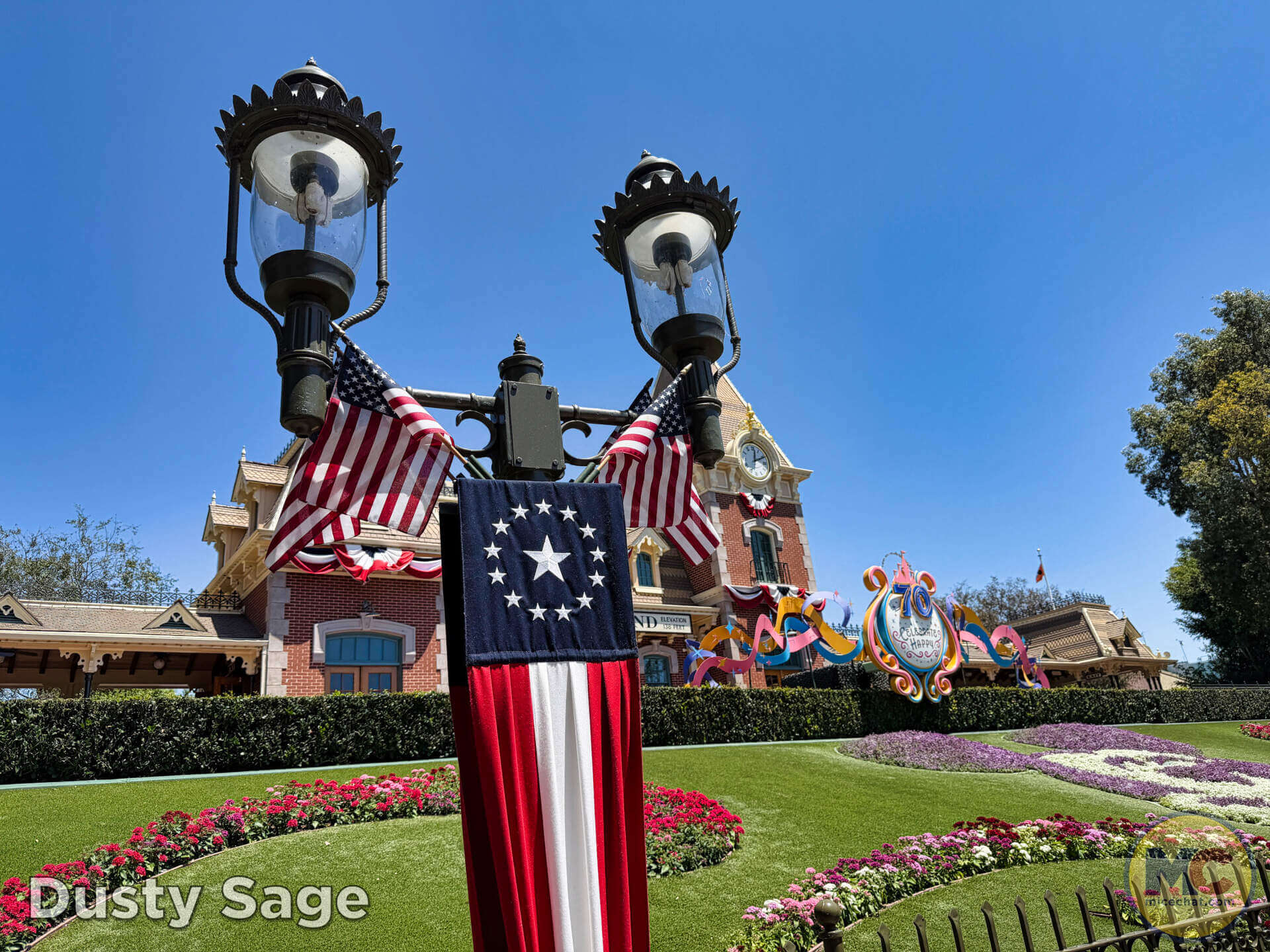 Red, white and blue banners on the Main Street train station