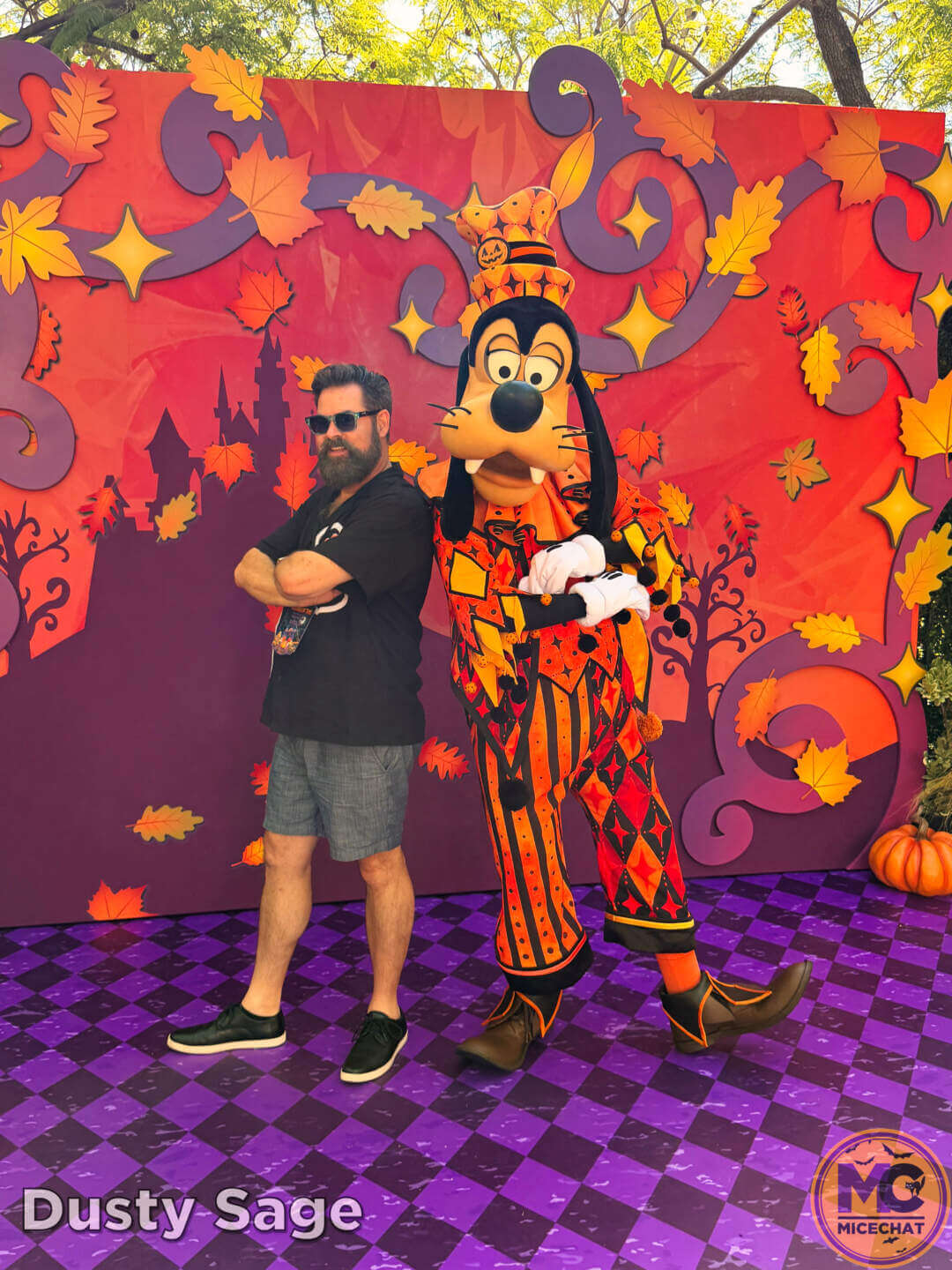 Dusty Sage of MiceChat meeting Goofy in his Halloween costume at Disneyland