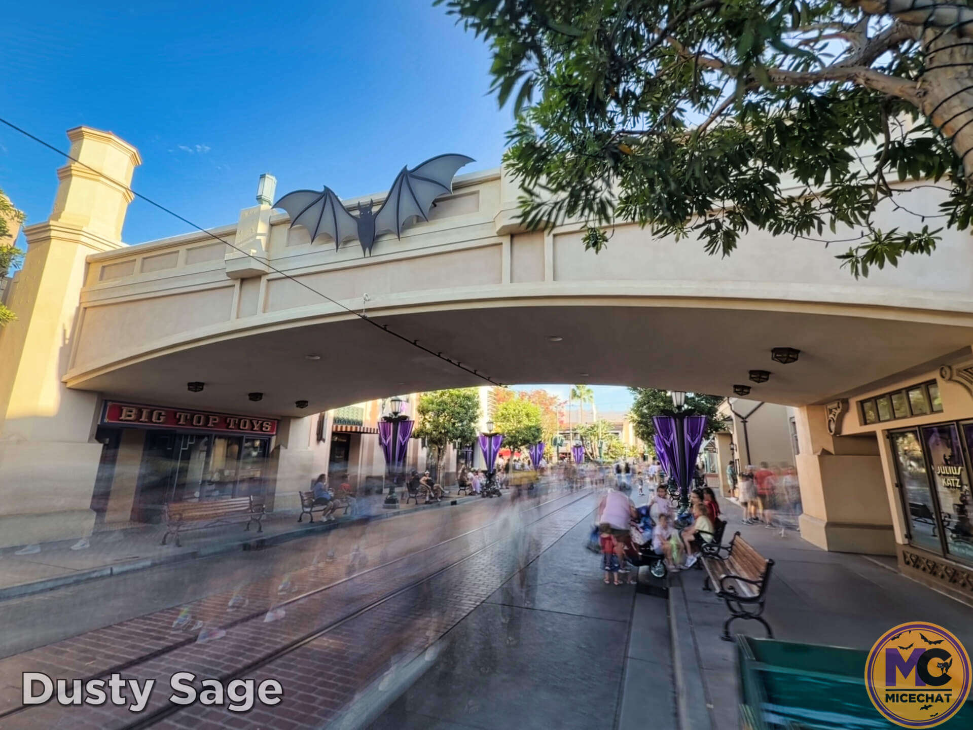 Motion blur of guests on Buena Vista Street during Halloween Time