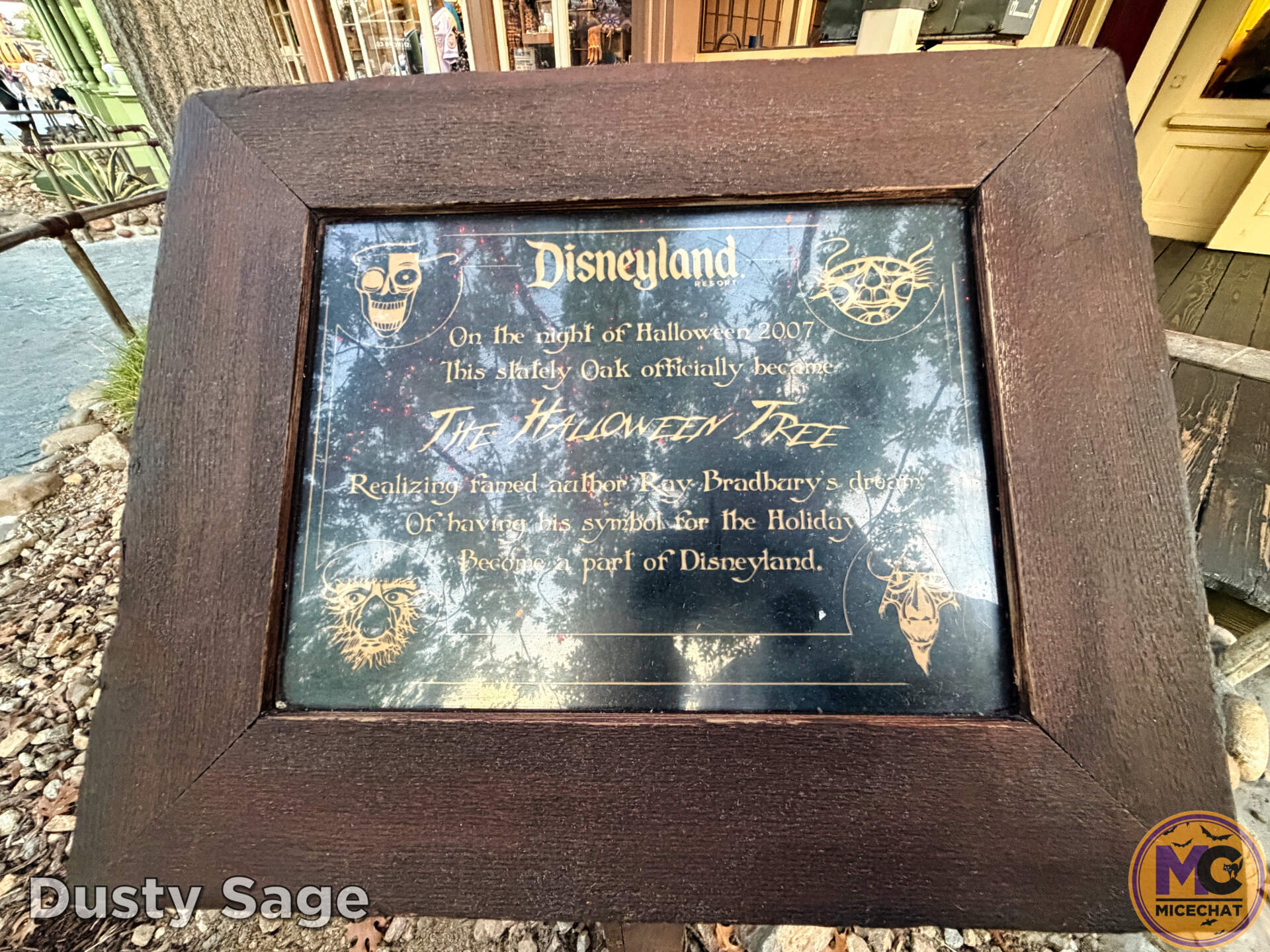 Dedication plaque at the base of the Halloween Tree in Frontierland