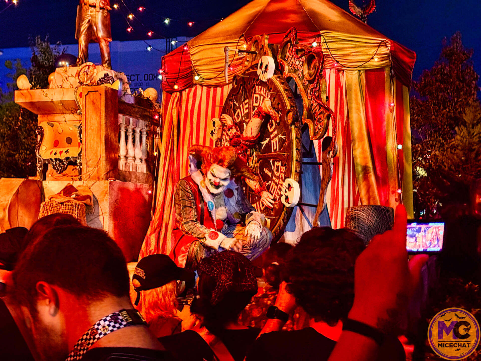 Jack the Clown at the Wheel of Chance in Downtown Clowntown at HHN 2026