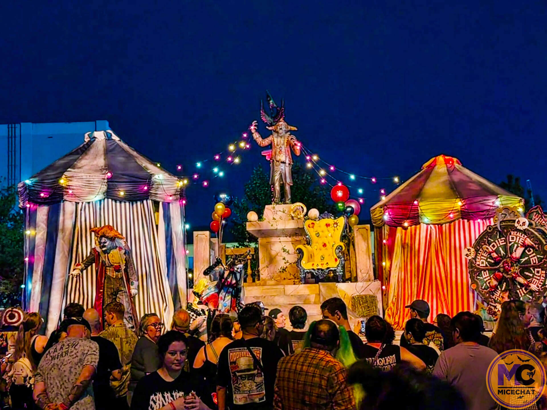 Downtown Clowntown scare zone stage with Jack the Clown's statue at HHN 2026