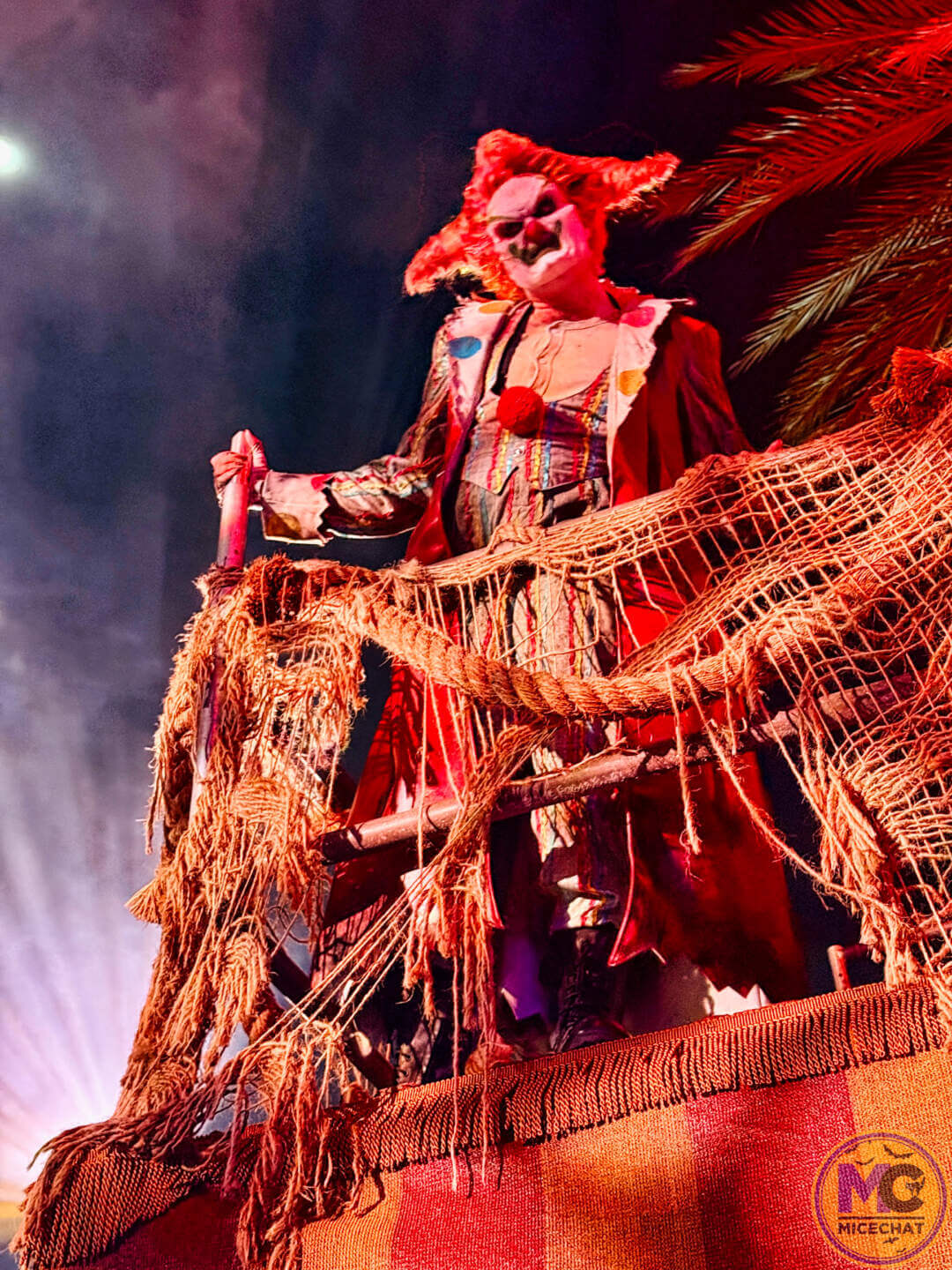 A clown atop a carnival tent in the Infernal Carnival of Nightmares at HHN 2026