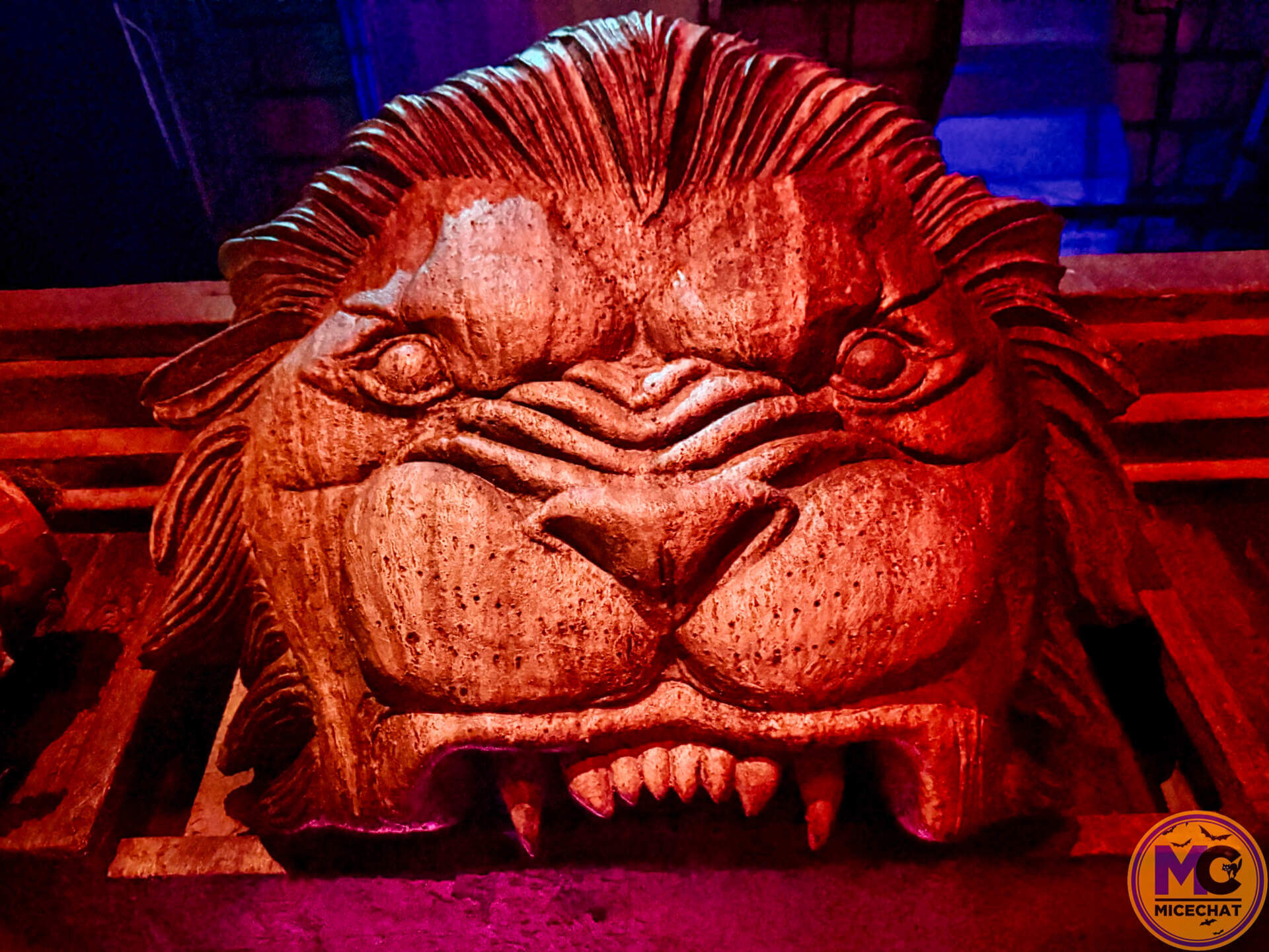 A carved lion head inside MADLANDS Caged Cannibals at HHN 2026