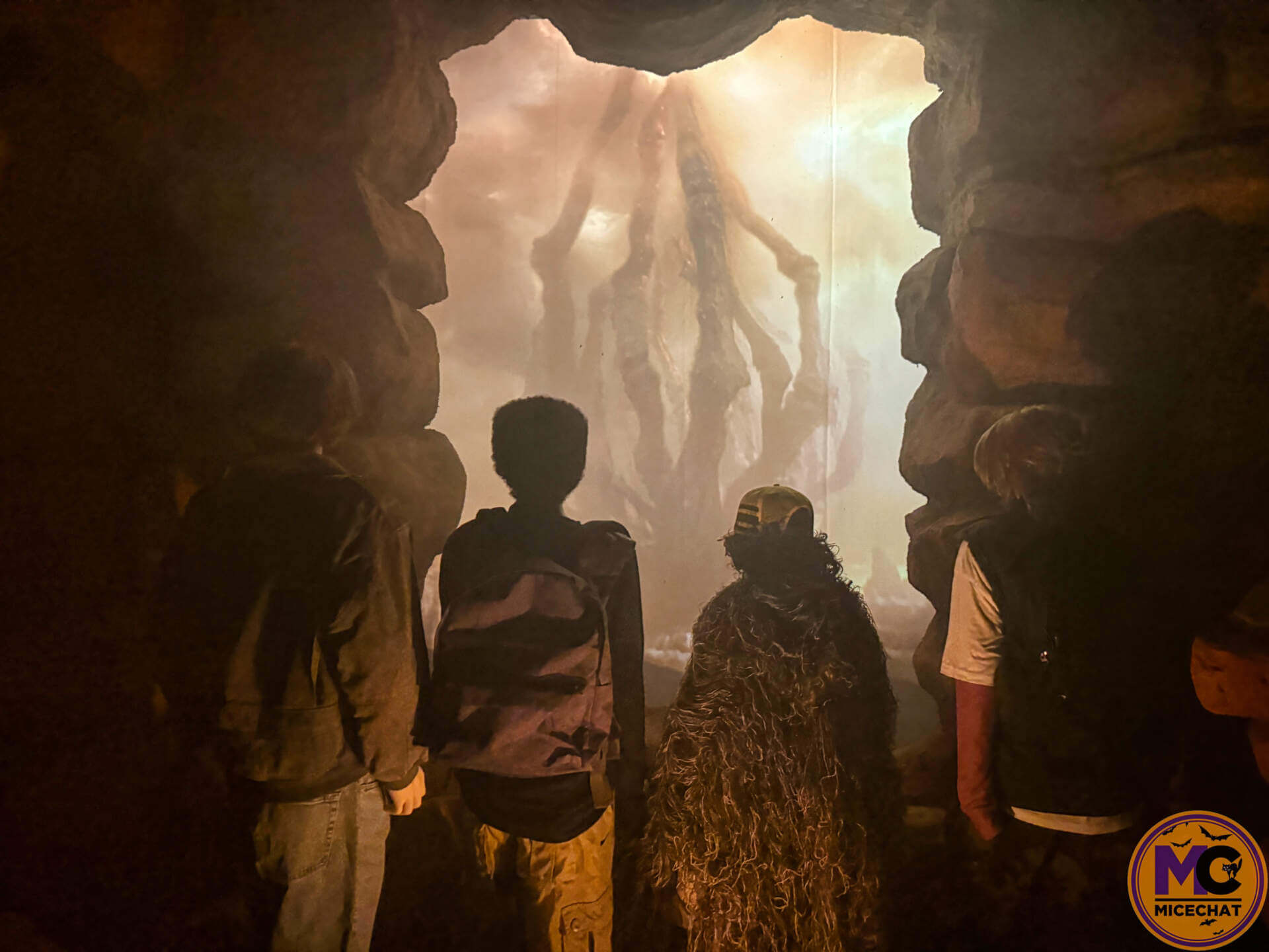 The Mind Flayer looms over the Hawkins kids in the Stranger Things house at HHN 2026