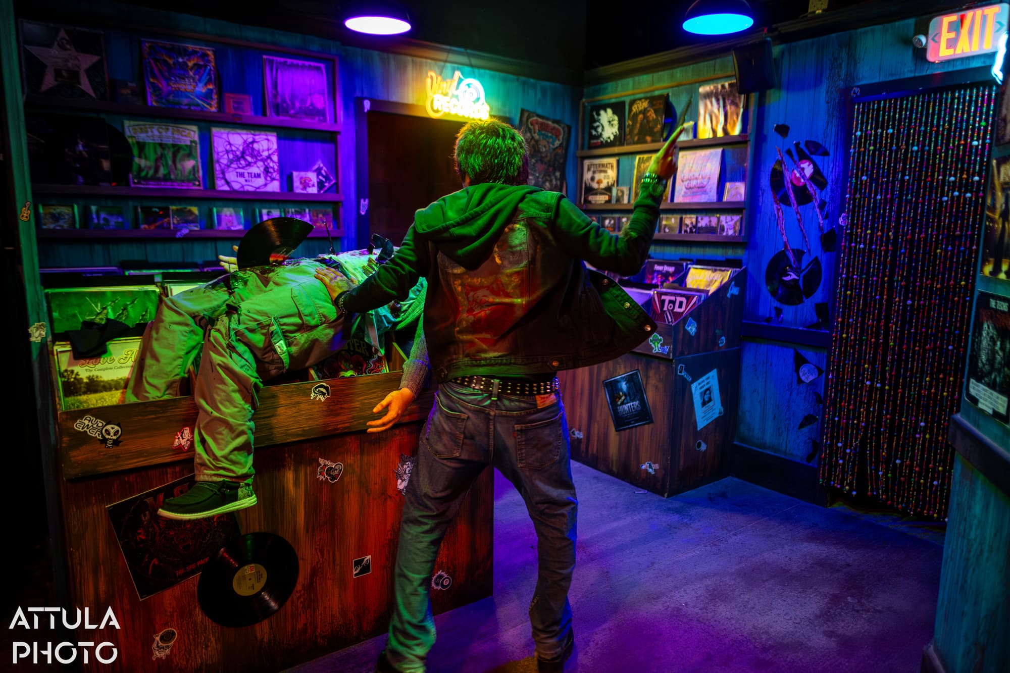 Detailed signage and props in the Wolves' Blood maze at Six Flags Magic Mountain