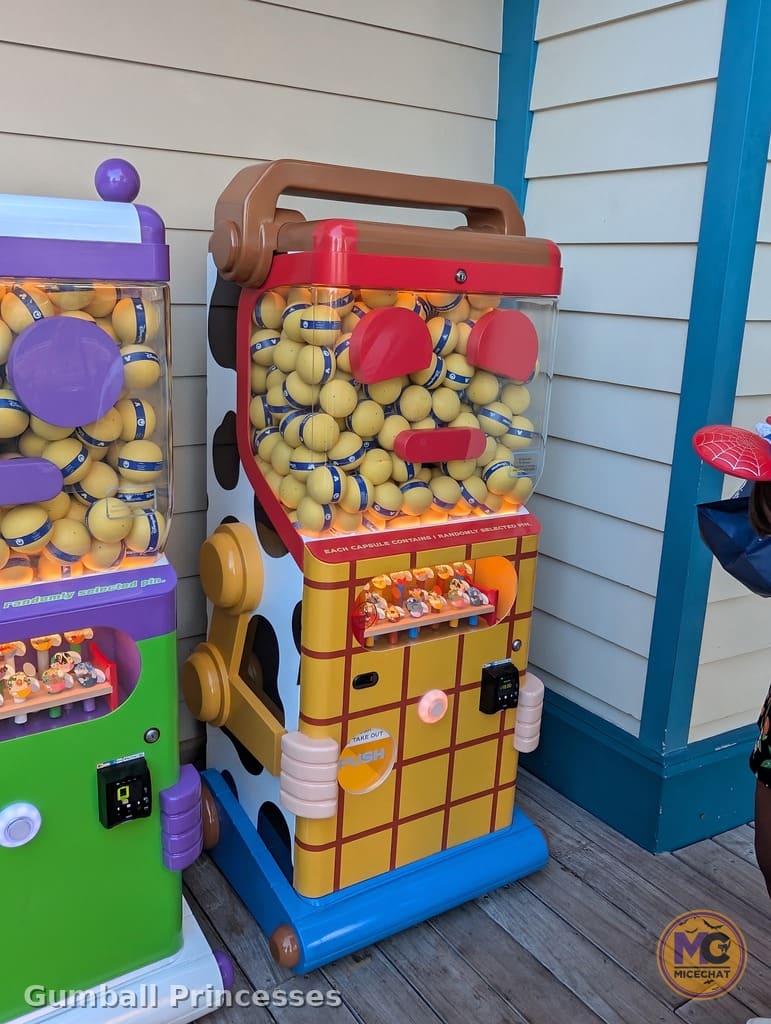 Close-up of the Woody mystery pin vending machine on Pixar Pier